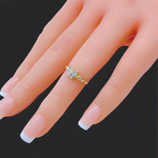 Anillo baby solido de mariposa con zirconias size 2 3_4” peso 1.2gr precio $96.00 2 piezas disponibles_